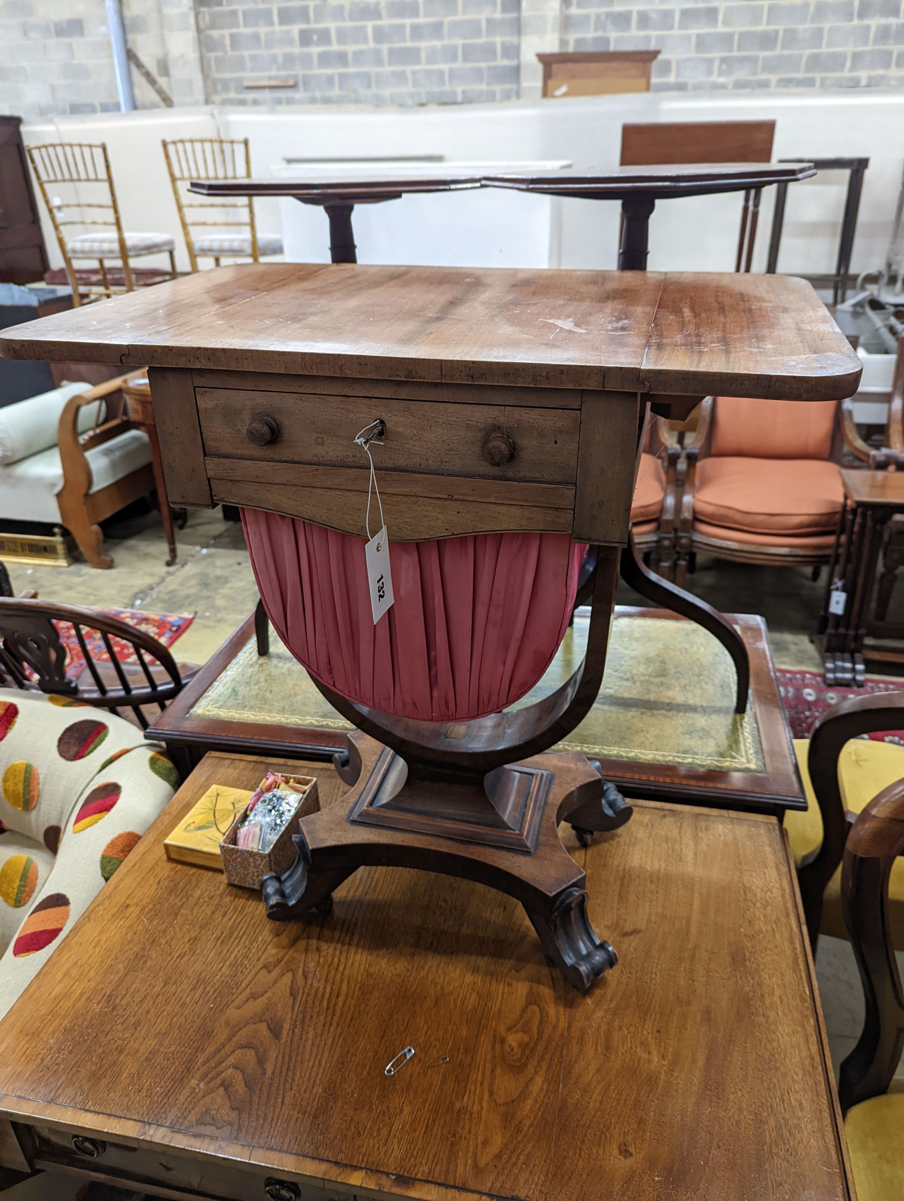 An early Victorian mahogany drop flap work table, width 64cm extended, depth 42cm, height 69cm